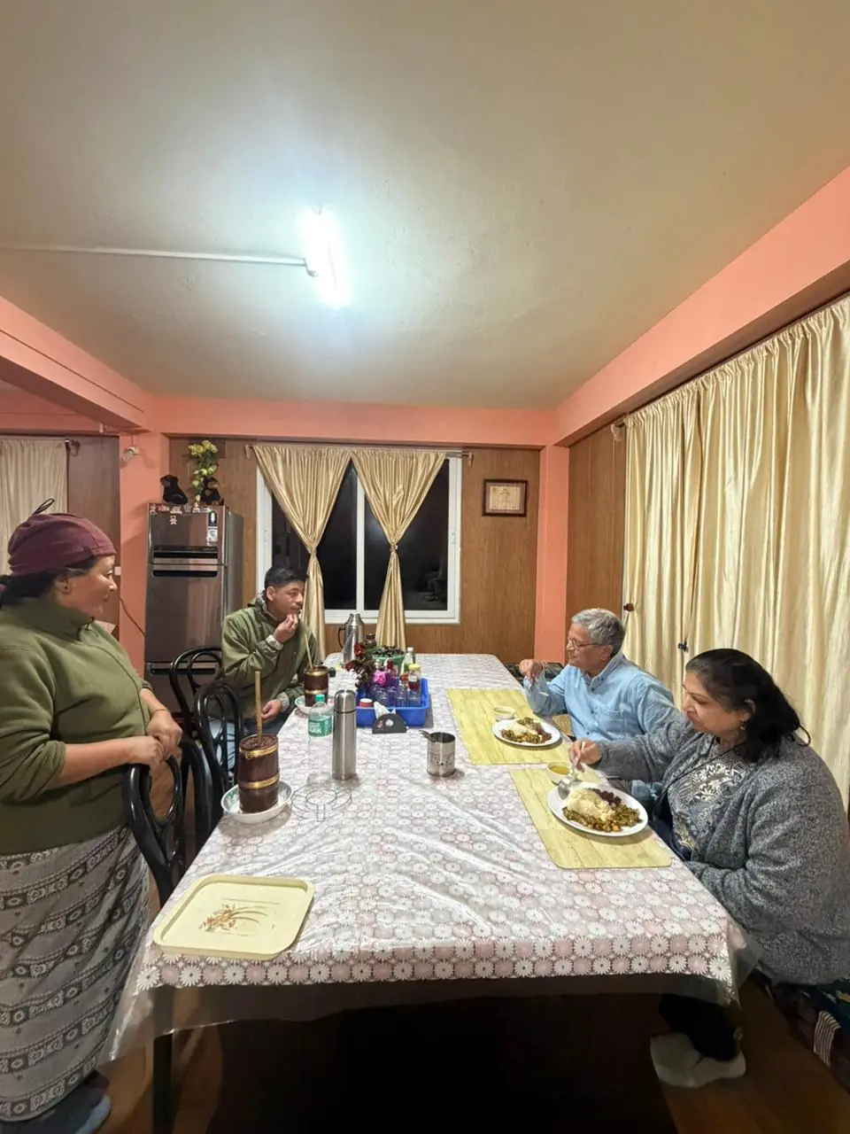 guests enjoying local food and beverage at Lali Gurash homestay Okhrey Sikkim